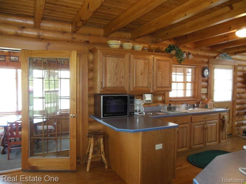 3216 West Road Millington, MI 48746 - Photo 29 of 59 French doors to 3 season room