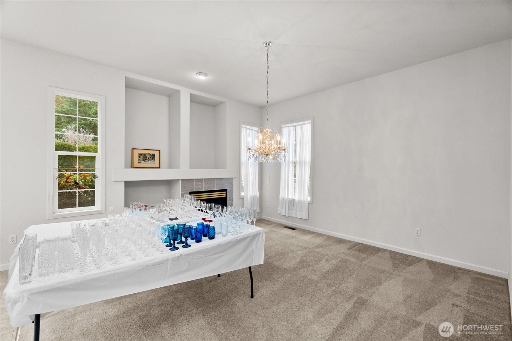 2312 Carnbee Court Southeast Lacey, WA 98513 - Photo 18 of 37 a living room with furniture and a large window