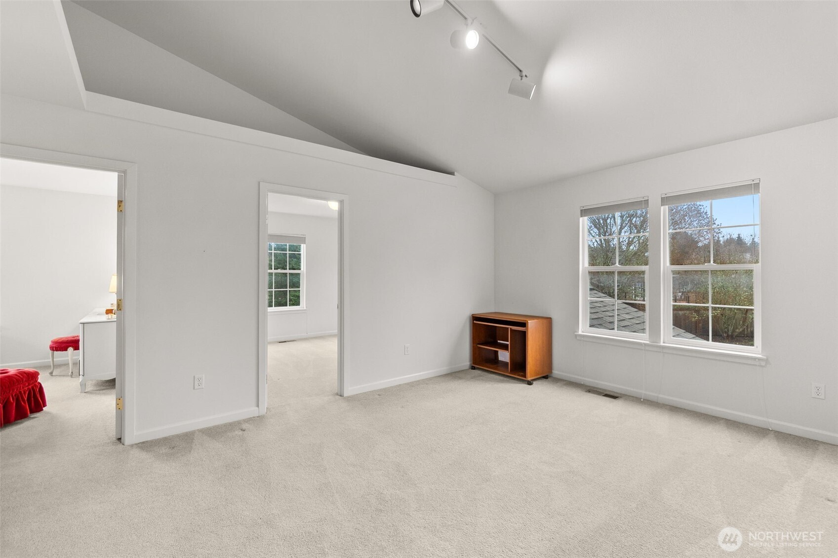 2312 Carnbee Court Southeast Lacey, WA 98513 - Photo 27 of 37 an empty room with a window and a kitchen