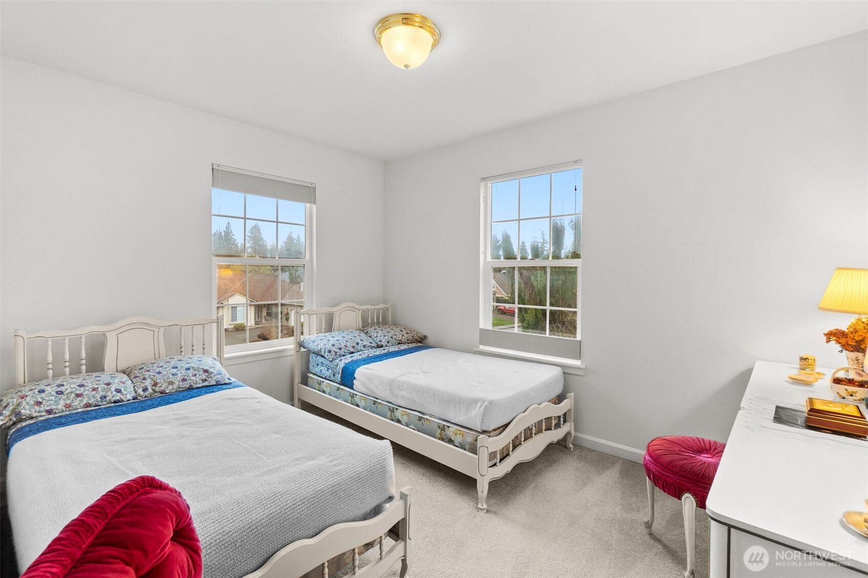 2312 Carnbee Court Southeast Lacey, WA 98513 - Photo 29 of 37 a bedroom with two beds and a window