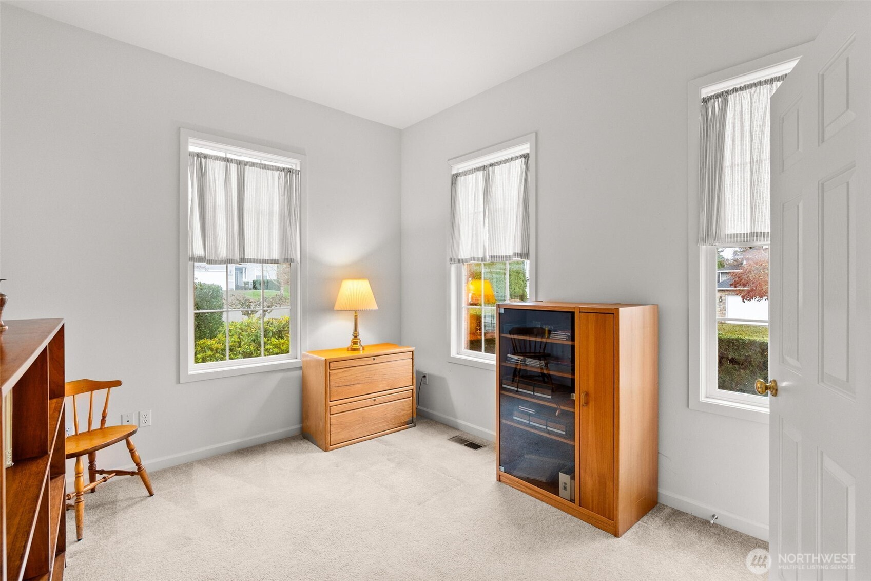 2312 Carnbee Court Southeast Lacey, WA 98513 - Photo 8 of 37 a living room with furniture and windows