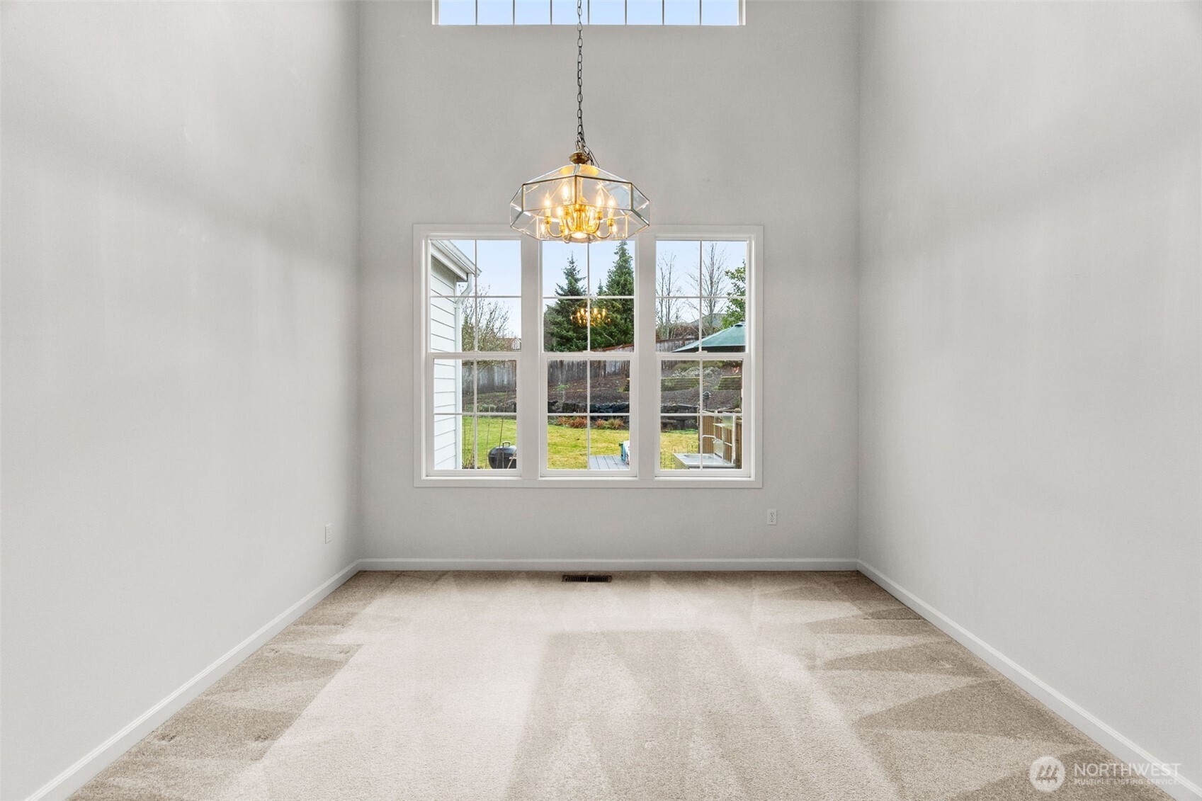 2312 Carnbee Court Southeast Lacey, WA 98513 - Photo 10 of 37 an empty room with windows