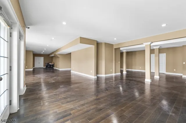 a view of a livingroom with wooden floor