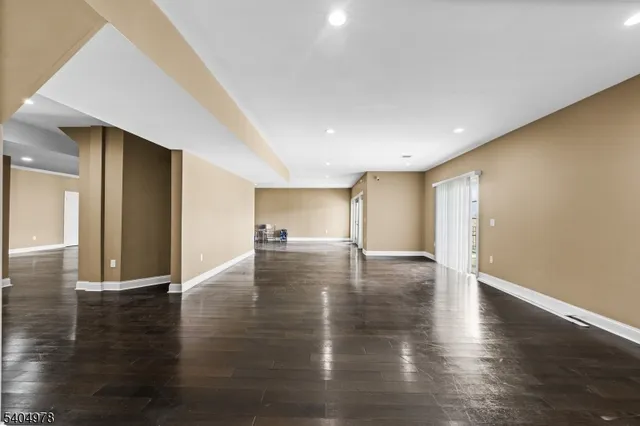 a view of a livingroom with wooden floor