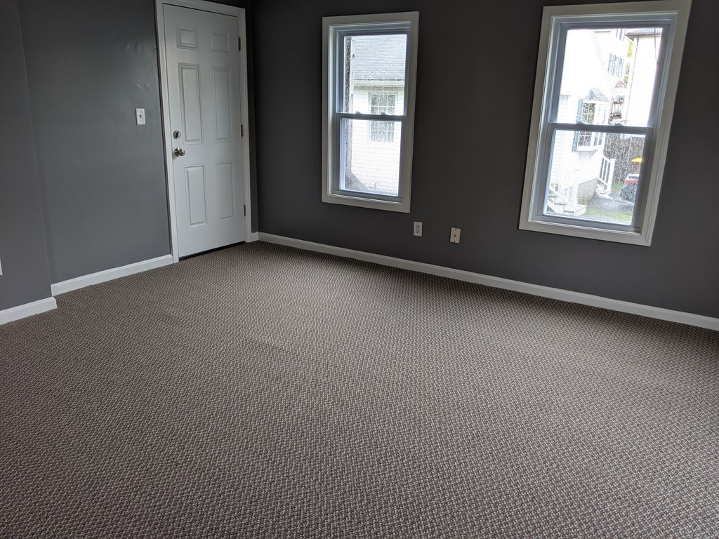 655 Grinnell Street Fall River, MA 02721 - Photo 12 of 24 an empty room with a window