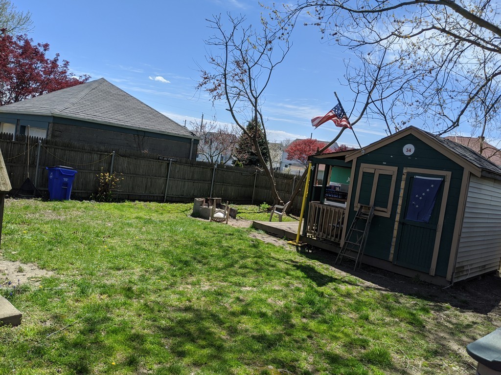 655 Grinnell Street Fall River, MA 02721 - Photo 3 of 24 a view of a house with backyard and sitting area