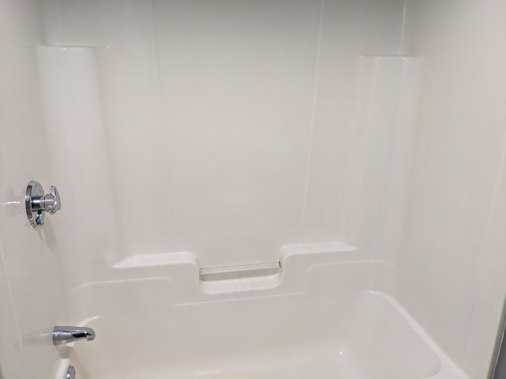 655 Grinnell Street Fall River, MA 02721 - Photo 9 of 24 a view of a bathtub in bathroom