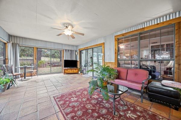 1816 Caddo Peak Road Joshua, TX 76058 - Photo 13 of 38 a living room with furniture and a large window