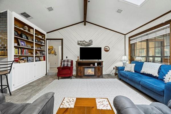 1816 Caddo Peak Road Joshua, TX 76058 - Photo 14 of 38 a living room with furniture and a flat screen tv
