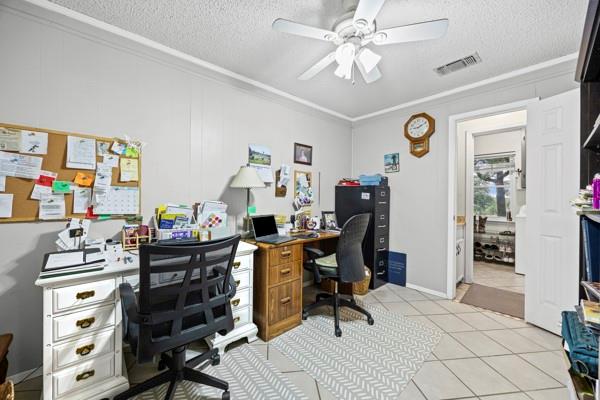 1816 Caddo Peak Road Joshua, TX 76058 - Photo 16 of 38 a view of a workspace with furniture and a window