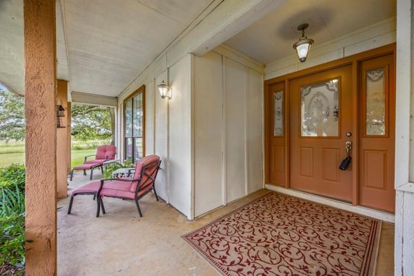 1816 Caddo Peak Road Joshua, TX 76058 - Photo 3 of 38 a view of a two room with furniture and window