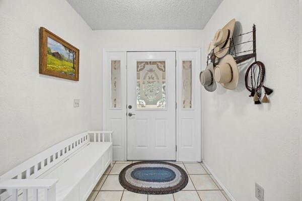 1816 Caddo Peak Road Joshua, TX 76058 - Photo 4 of 38 a bathroom with a toilet and a shower