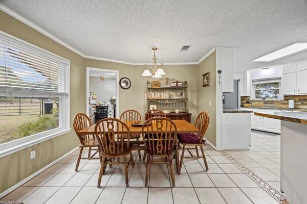 1816 Caddo Peak Road Joshua, TX 76058 - Photo 7 of 38 a view of a dining room with furniture window and outside view