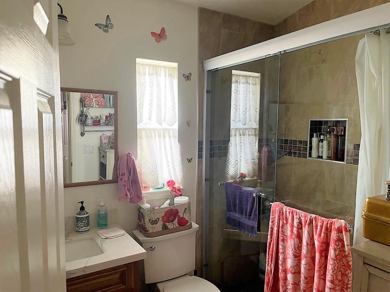 6130 Monterey Road, Unit 289 San Jose, CA 95138 - Photo 11 of 17 a living room with furniture and a window