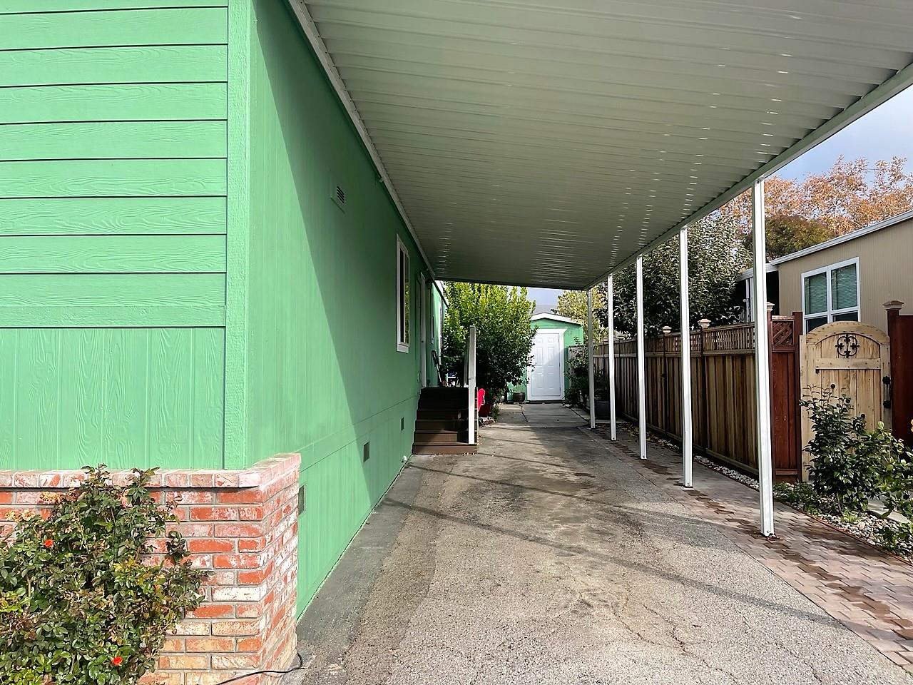6130 Monterey Road, Unit 289 San Jose, CA 95138 - Photo 14 of 17 a view of a backyard with potted plants