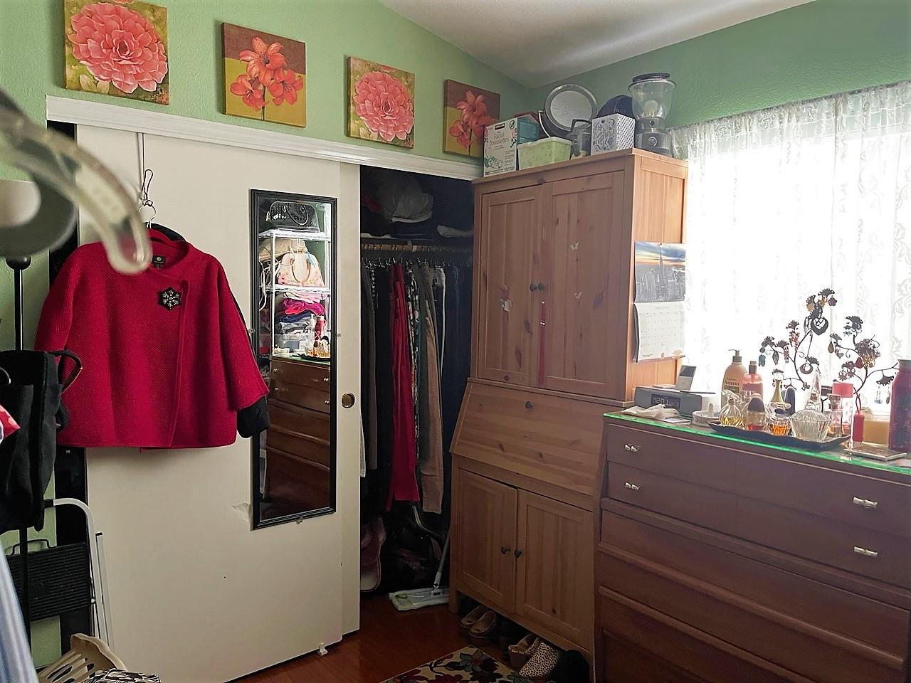 6130 Monterey Road, Unit 289 San Jose, CA 95138 - Photo 8 of 17 a view of walk in closet with clothes and shoes