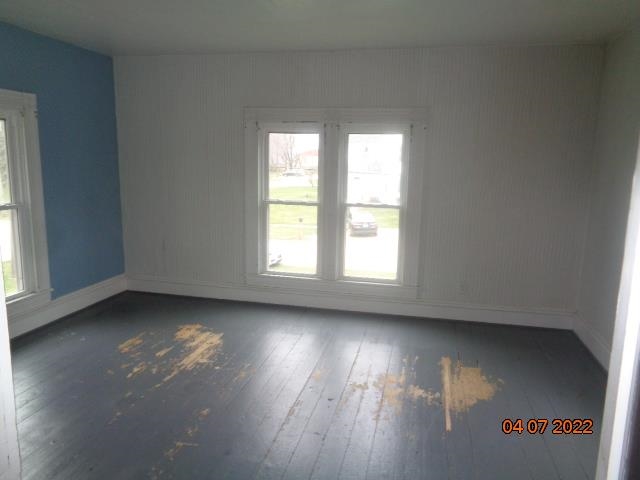 401 2nd Street Kings, IL 61068 - Photo 17 of 17 an empty room with wooden floor and windows