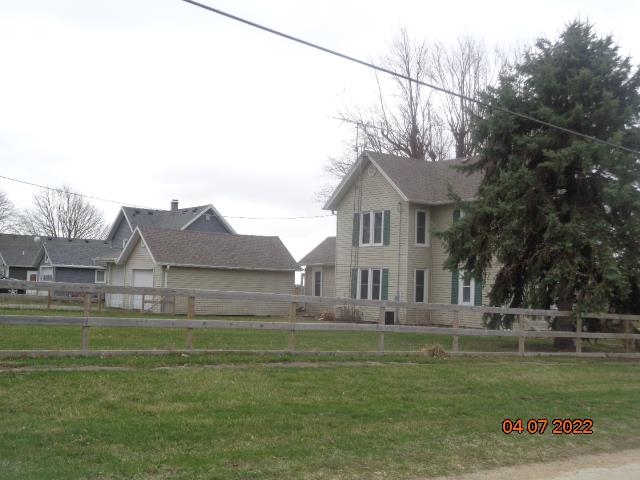 401 2nd Street Kings, IL 61068 - Photo 2 of 17 a front view of a house with a garden