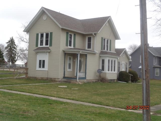 401 2nd Street Kings, IL 61068 - Photo 4 of 17 a front view of a house with a yard