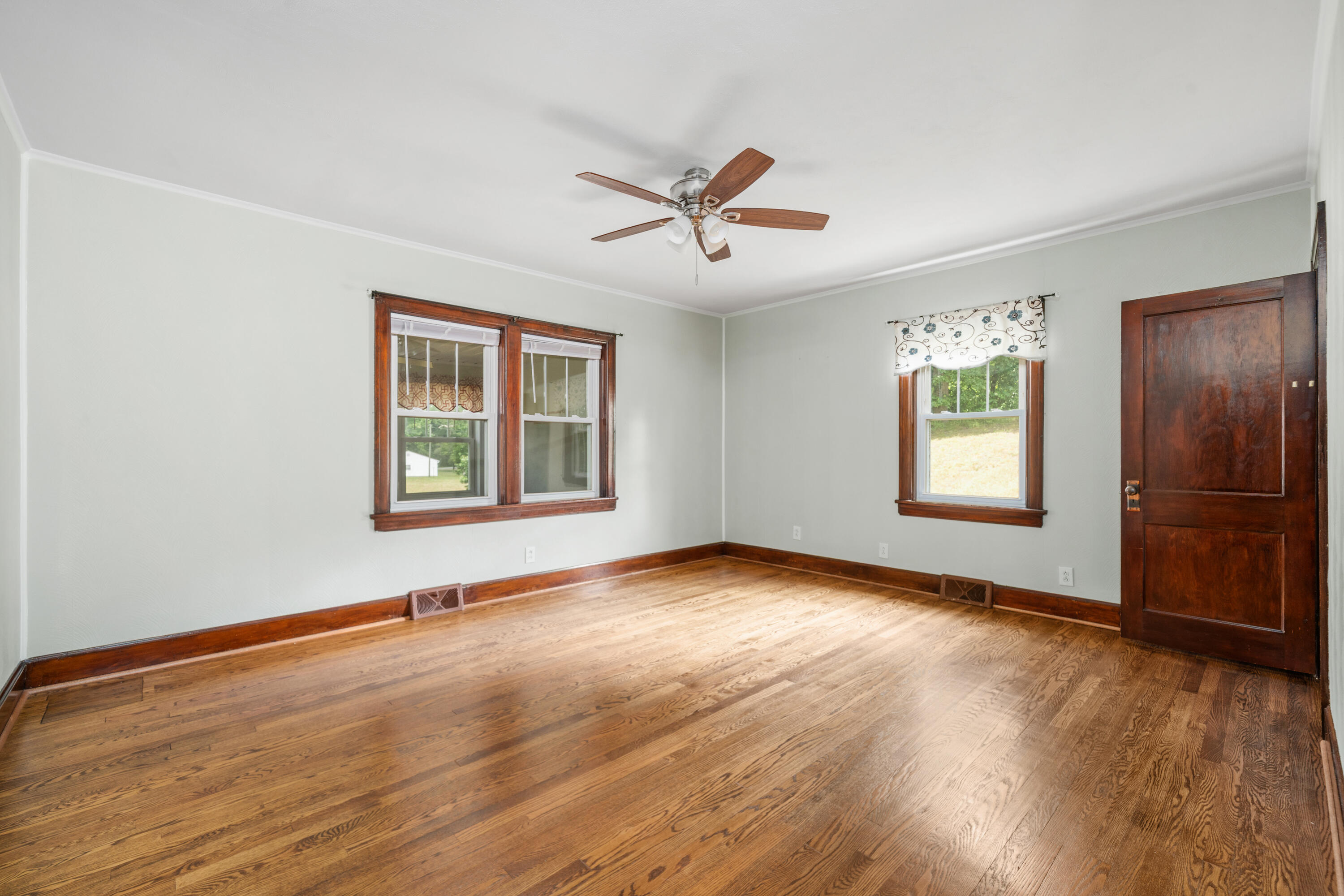 77 Mountain Pass Road Blue Ridge, VA 24064 - Photo 11 of 25 wooden floor in an empty room with a window