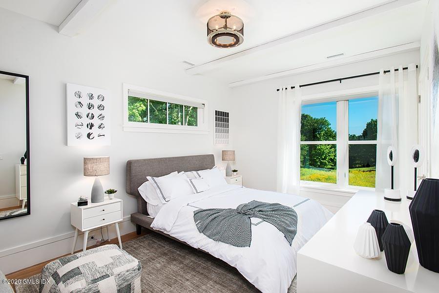 29 Goodsell Hill Road Redding, CT 06896 - Photo 18 of 29 a bedroom with a bed and a window