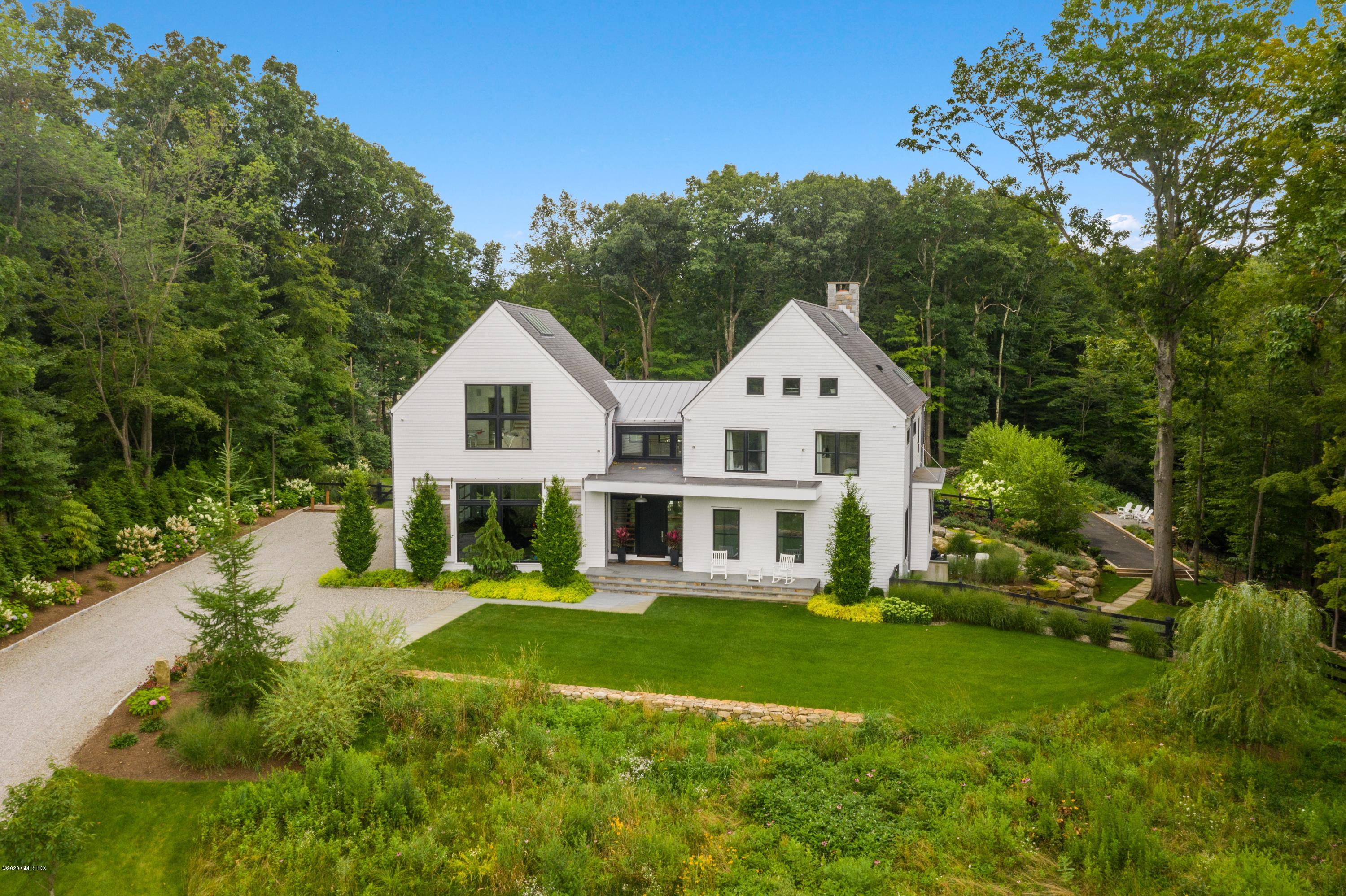 29 Goodsell Hill Road Redding, CT 06896 - Photo 2 of 29 a front view of a house with a yard