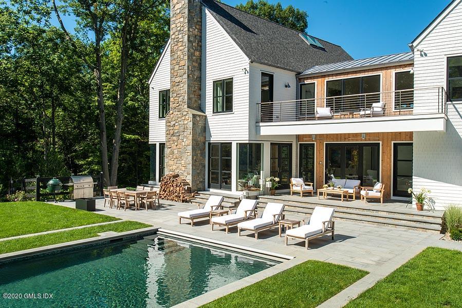 29 Goodsell Hill Road Redding, CT 06896 - Photo 27 of 29 a swimming pool view with a outdoor seating