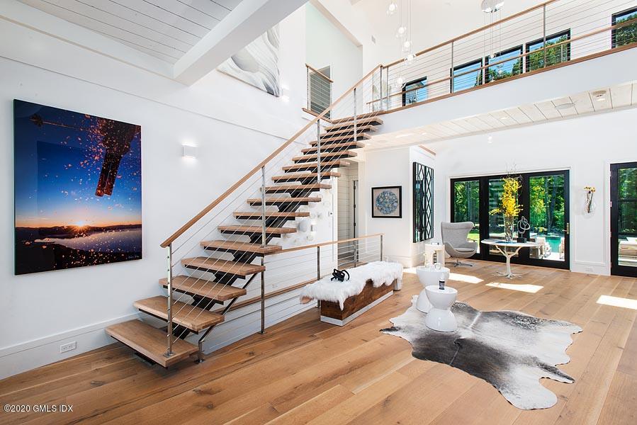 29 Goodsell Hill Road Redding, CT 06896 - Photo 5 of 29 a living room with furniture and a large window