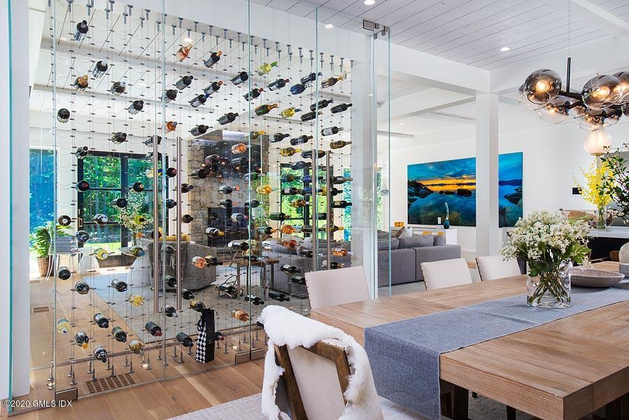 29 Goodsell Hill Road Redding, CT 06896 - Photo 7 of 29 a living room with furniture and flowers