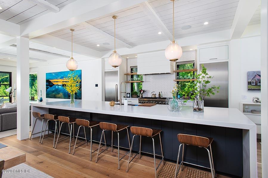 29 Goodsell Hill Road Redding, CT 06896 - Photo 8 of 29 a room with stainless steel appliances kitchen island a table and chairs in it