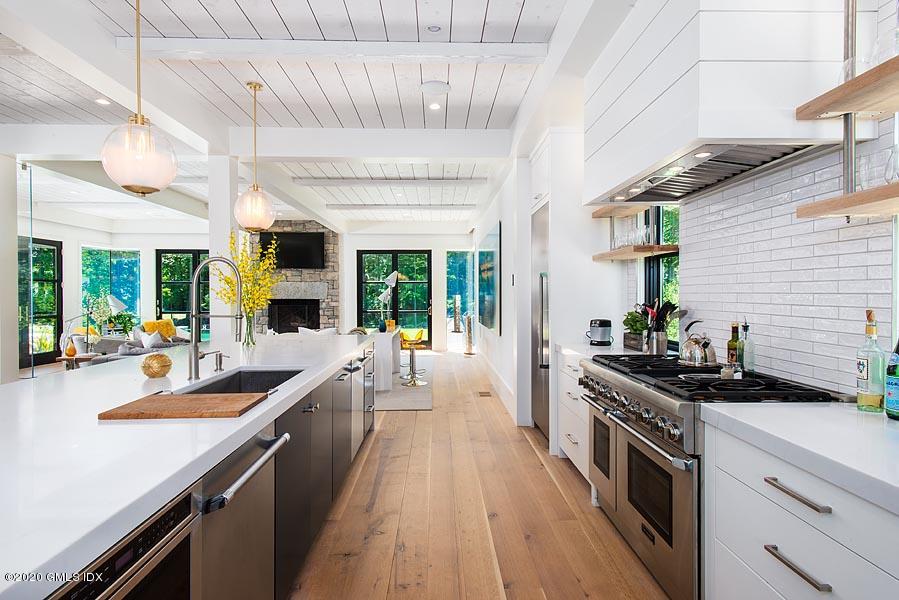 29 Goodsell Hill Road Redding, CT 06896 - Photo 9 of 29 a kitchen with sink stove and cabinets
