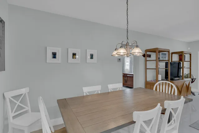 a kitchen with stainless steel appliances granite countertop a stove and a refrigerator