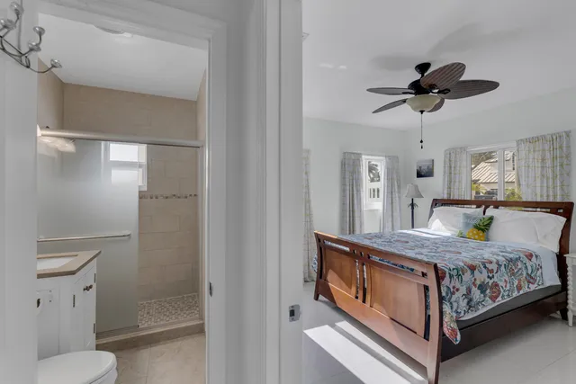 a view of a bedroom with washer and dryer
