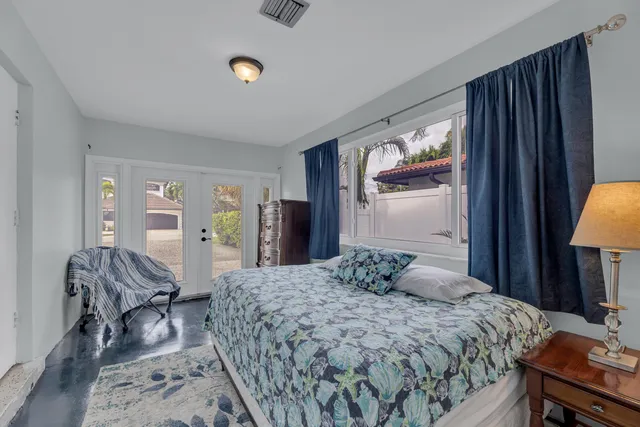 a view of a backyard with a sitting area