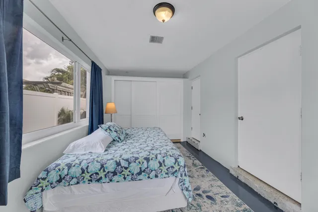 a view of swimming pool with seating space