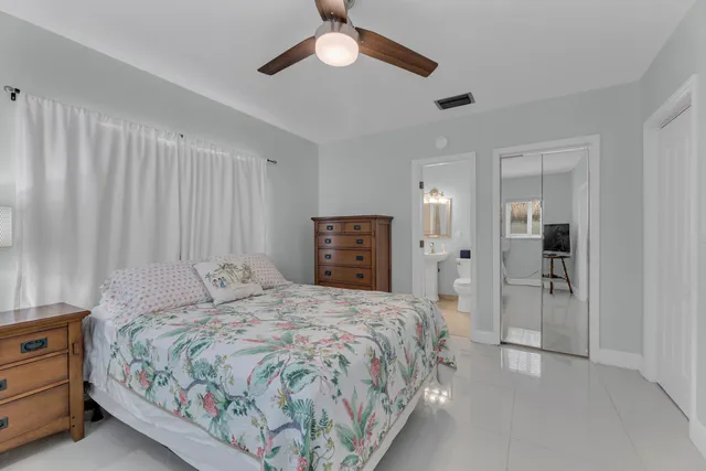 a view of a swimming pool with outdoor seating