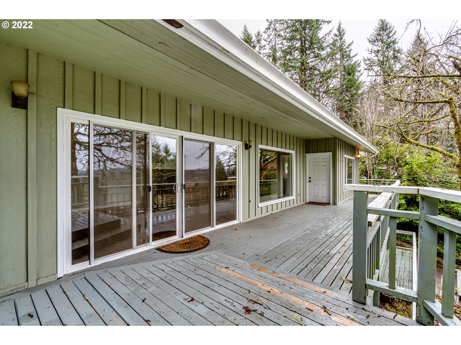 2655 Cresta De Ruta Street Eugene, OR 97403 - Photo 26 of 32 a view of backyard with deck and wooden floor