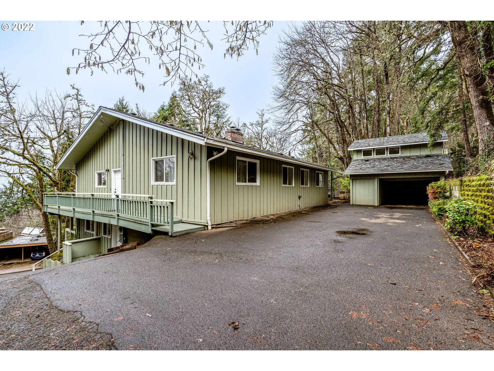 2655 Cresta De Ruta Street Eugene, OR 97403 - Photo 28 of 32 a view of a house with a yard and garage