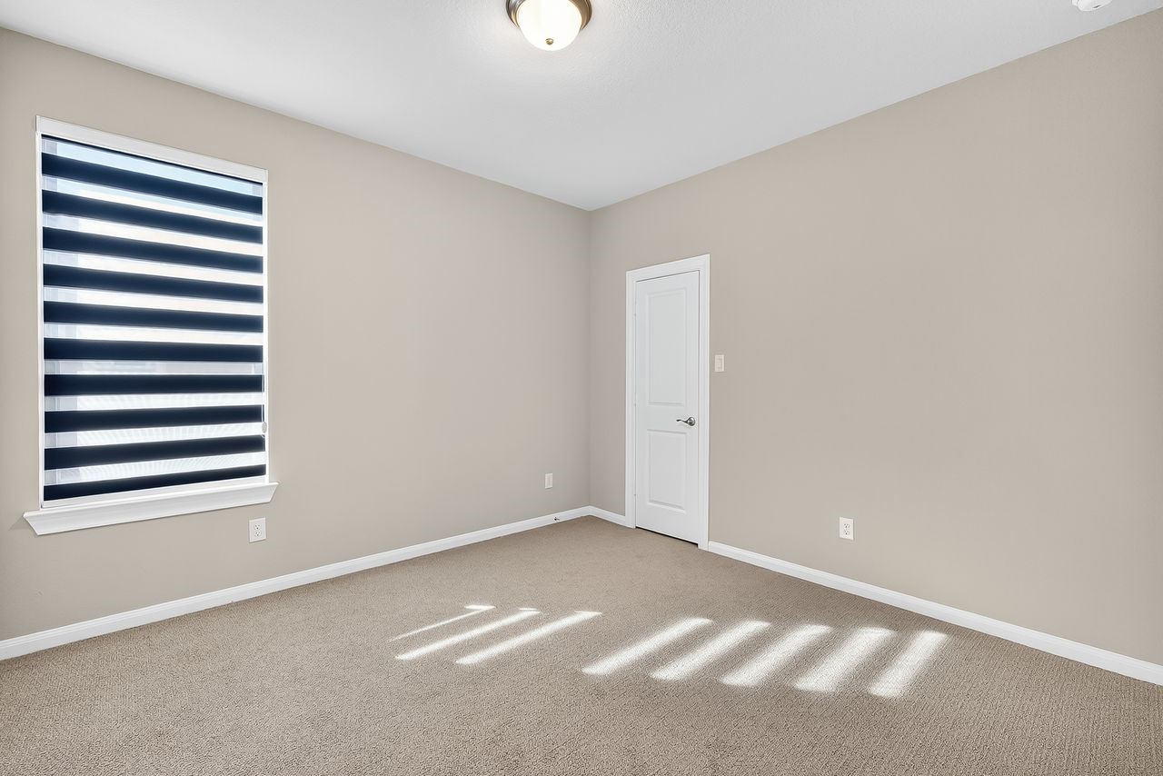4209 Colony Pines Lane Houston, TX 77080 - Photo 19 of 30 a view of an empty room with a window