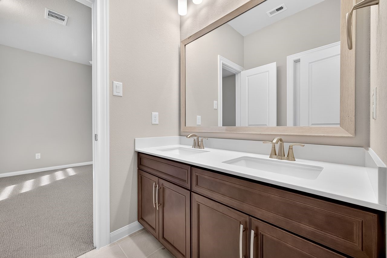 4209 Colony Pines Lane Houston, TX 77080 - Photo 20 of 30 a bathroom with a sink and a mirror