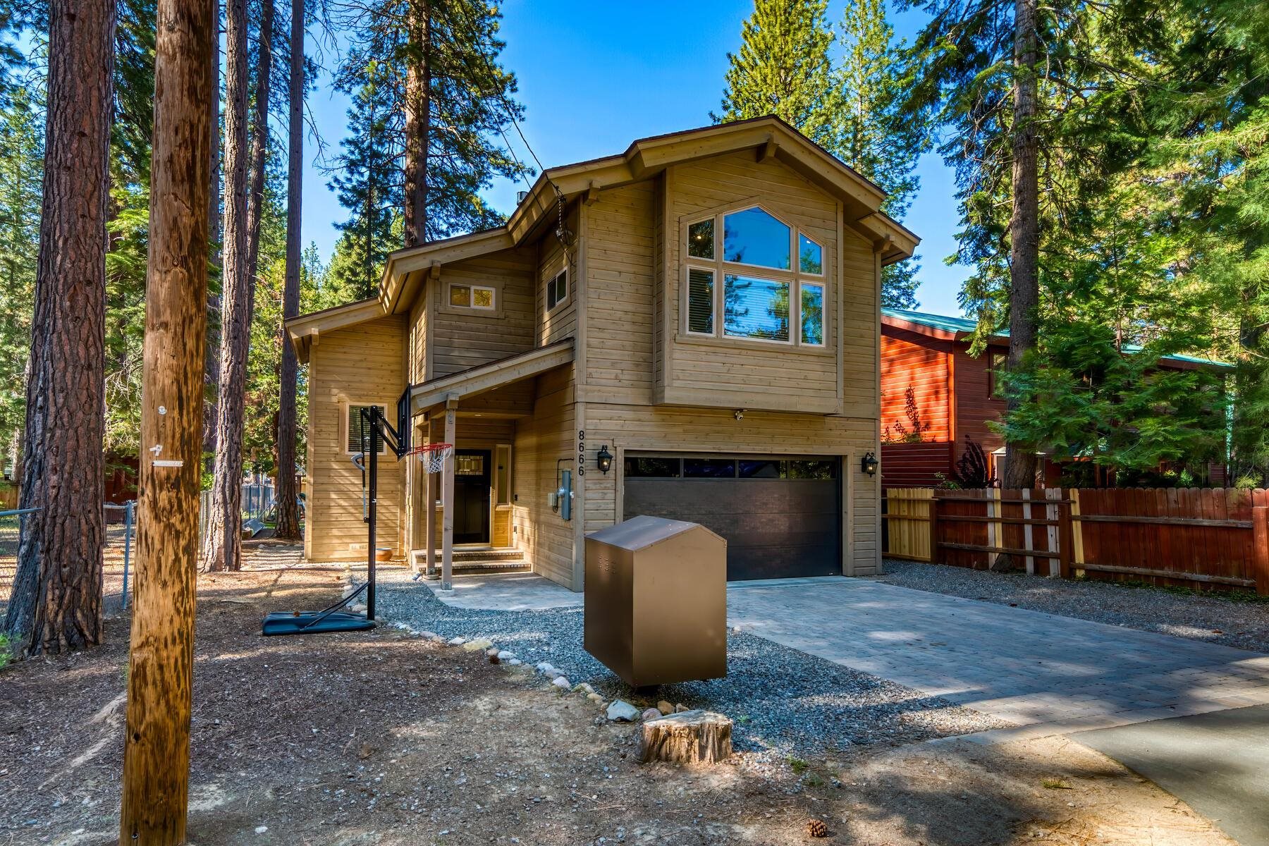 8666 Brook Avenue Kings Beach, CA 96143 - Photo 2 of 21 a front view of a house with a yard
