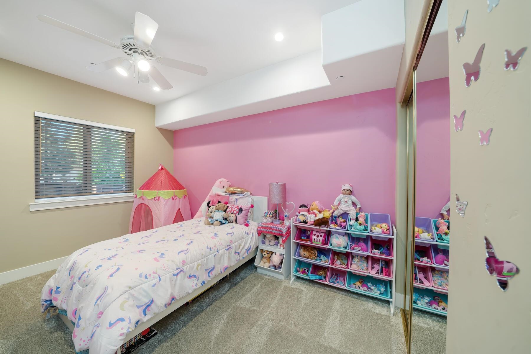 8666 Brook Avenue Kings Beach, CA 96143 - Photo 9 of 21 a bedroom with bed and window