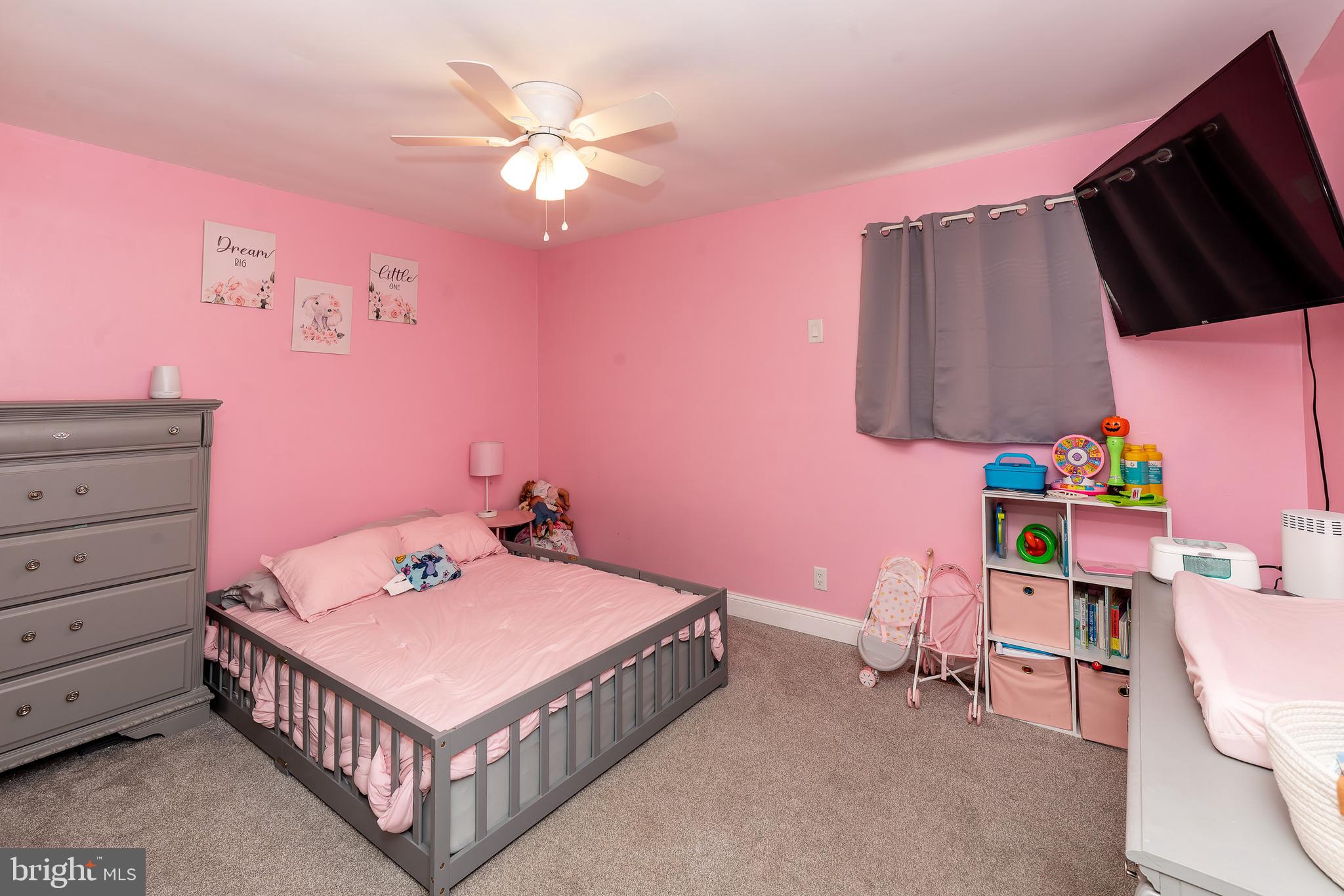1207 Turnersville Road Pine Hill, NJ 08021 - Photo 13 of 31 a bedroom with a bed and a dresser