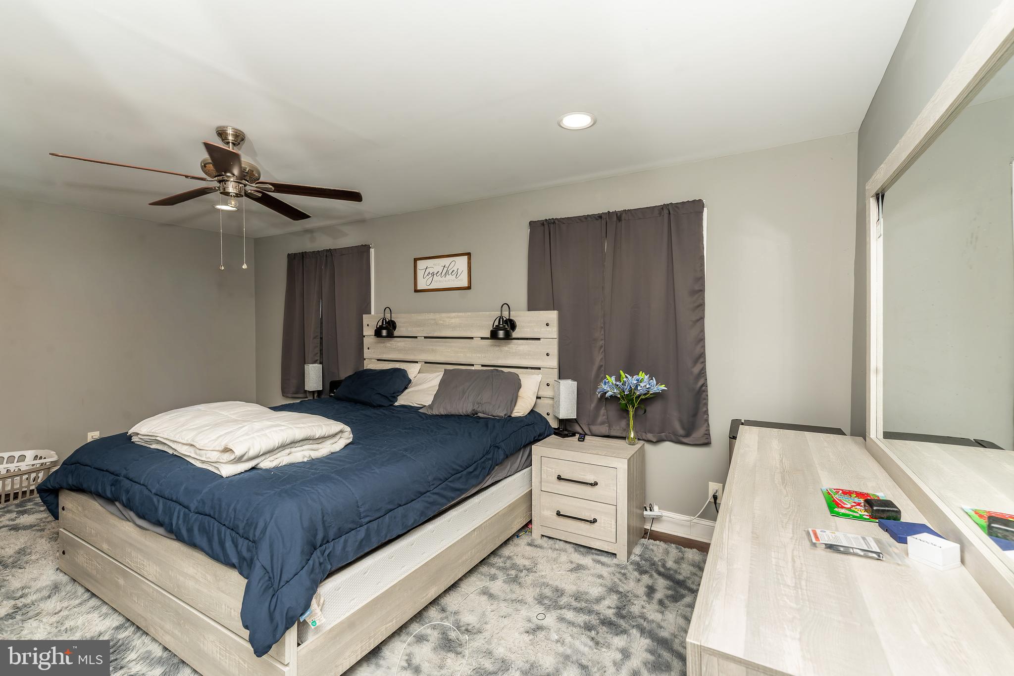 1207 Turnersville Road Pine Hill, NJ 08021 - Photo 15 of 31 a living room with furniture and a chandelier