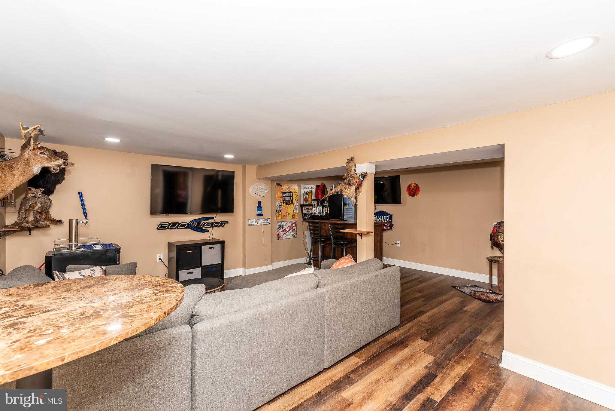 1207 Turnersville Road Pine Hill, NJ 08021 - Photo 19 of 31 a living room with furniture and a flat screen tv