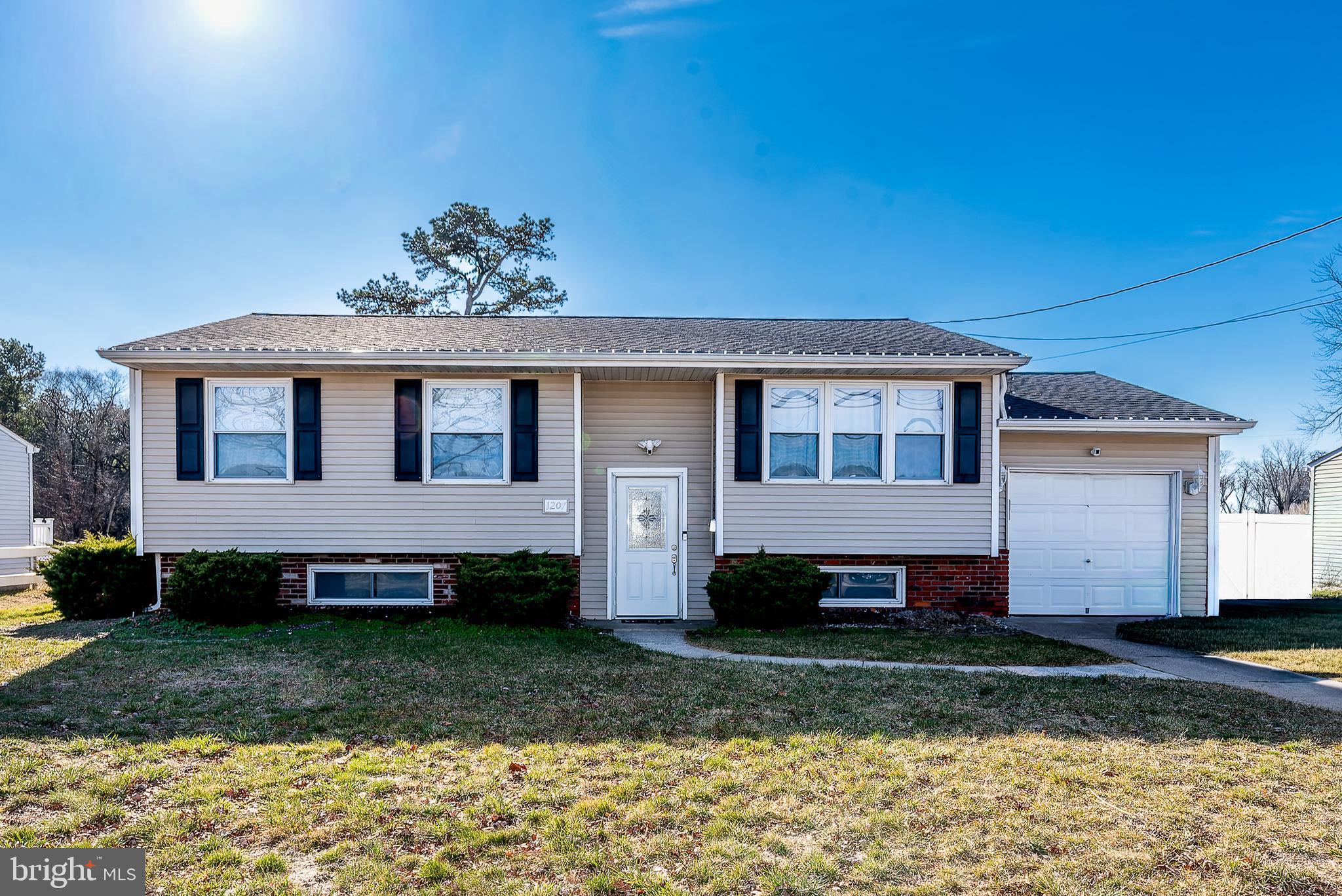 1207 Turnersville Road Pine Hill, NJ 08021 - Photo 2 of 31 a front view of a house with a garden