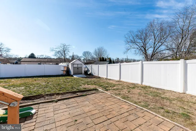 a view of a backyard with a slide