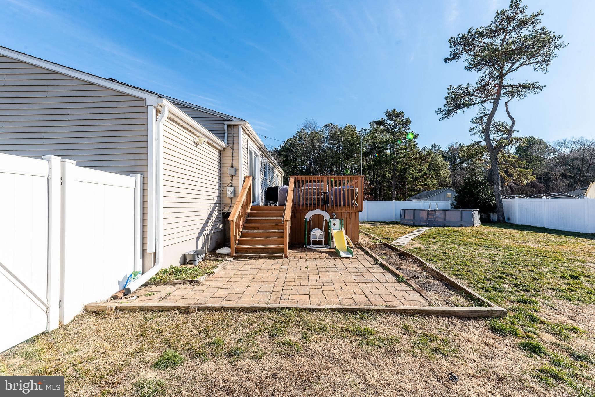 1207 Turnersville Road Pine Hill, NJ 08021 - Photo 27 of 31 a view of a backyard with a slide