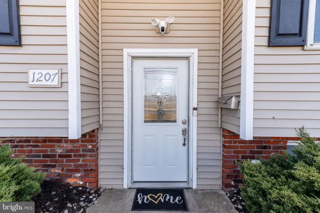 a front view of a house with a garage