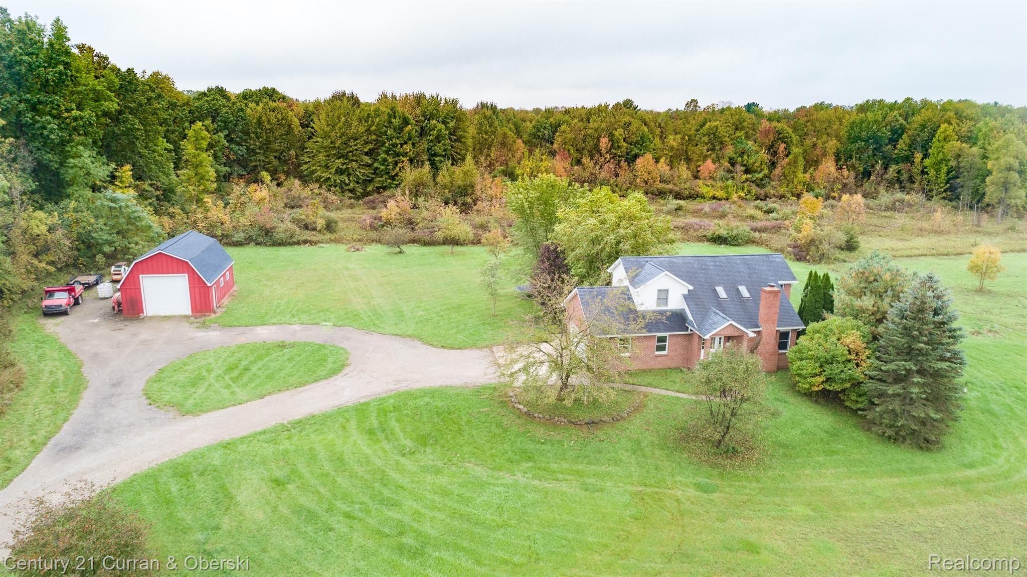 234 Frick Road Leonard, MI 48367 - Photo 2 of 38 DJI_0001.jpg
